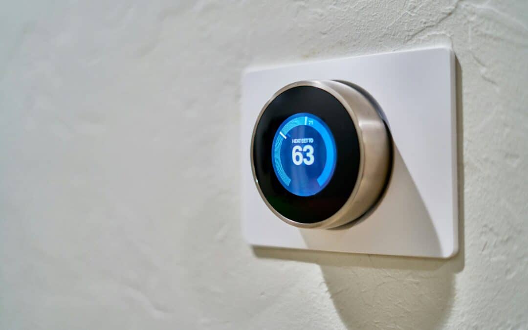 Smart thermostat controlling home temperature, illustrating energy savings for homeowners.